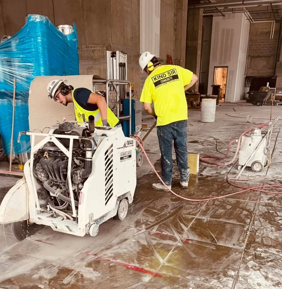 Kind Sir crew cutting concrete on a commercial jobsite